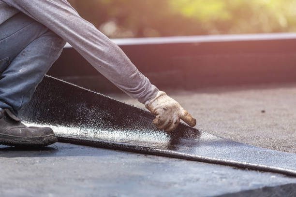 Professional Basement Waterproofing technician working in Palmetto, GA